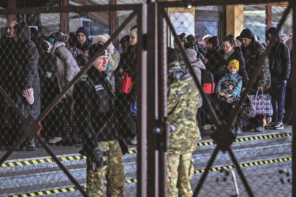 Ukrainian families forced to flee their homes and leave the country