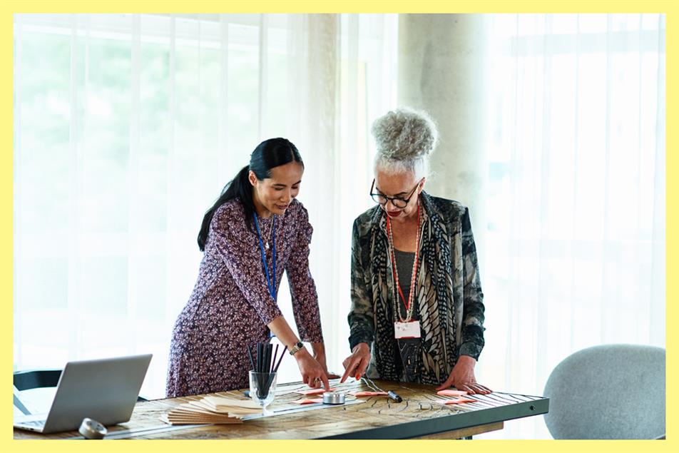 Workers pointing at work