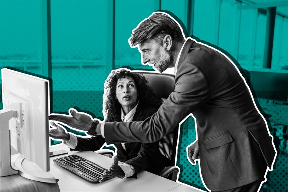 Man having heated discussion with woman in office