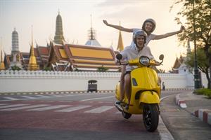 two people on scooter