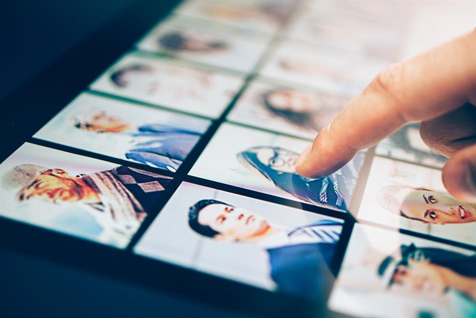  a person choosing recruitment candidates via AI technology 