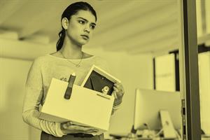 Person carrying a box in an office