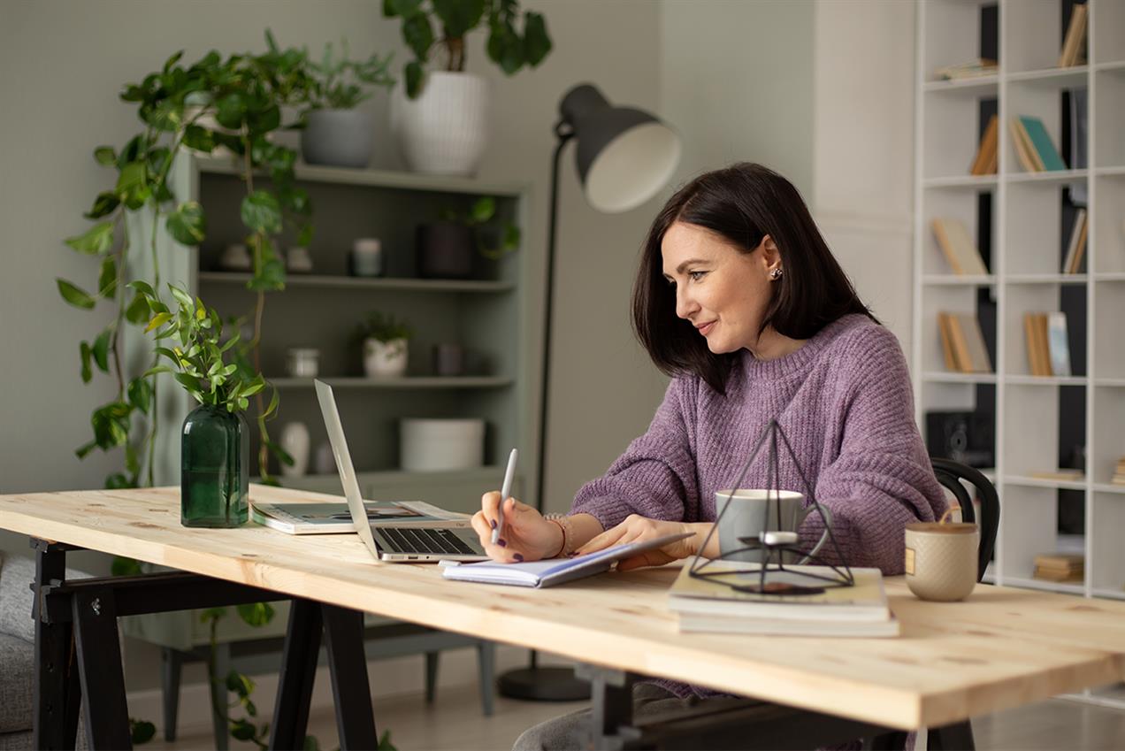 woman working at home office desk