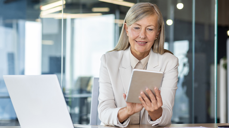 Older woman with tablet