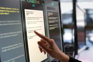 Finger on Chatbot screen