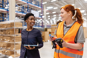 People walking through warehouse