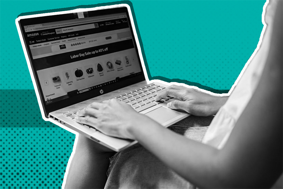 Close up of someone typing on a laptop