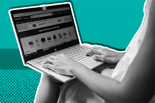 Close up of someone typing on a laptop