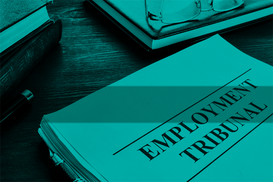 Pile of papers with 'employment tribunal' written on them