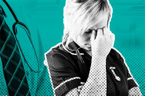 Nurse with head down and hand on her face