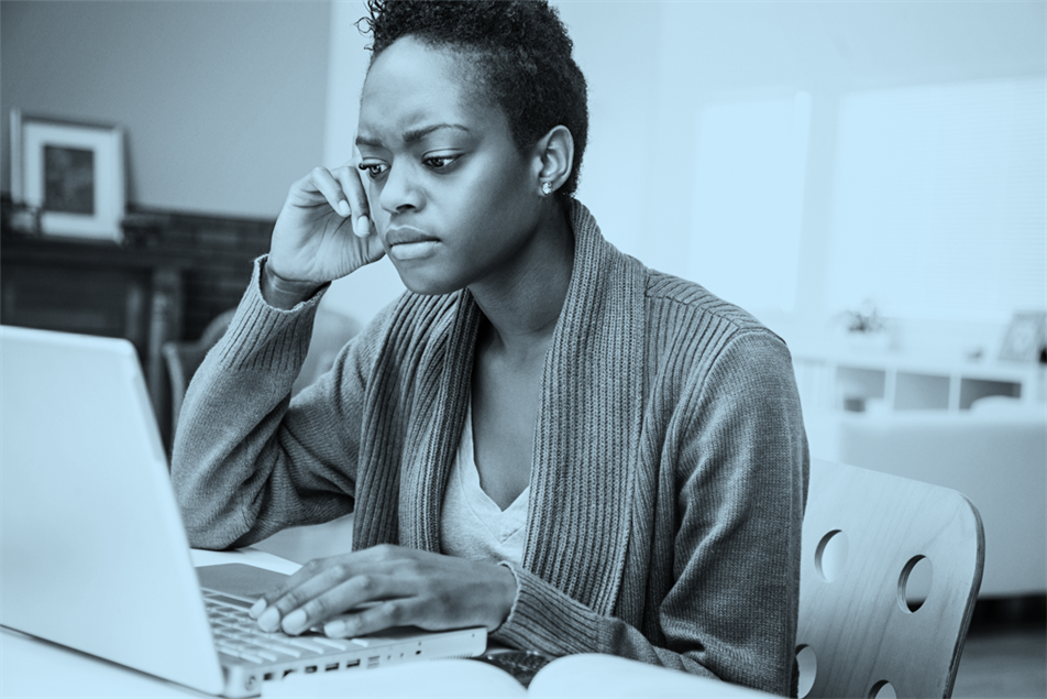 Person sat in front of a laptop