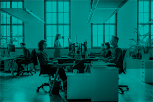 People sat at desks in an office