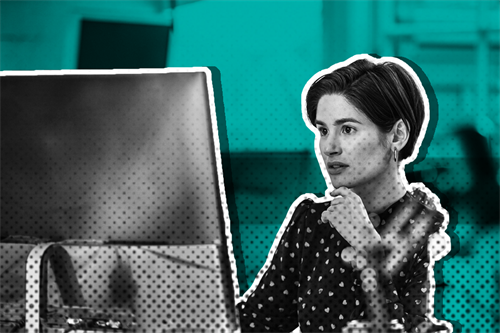 Woman sat in front of a computer screen