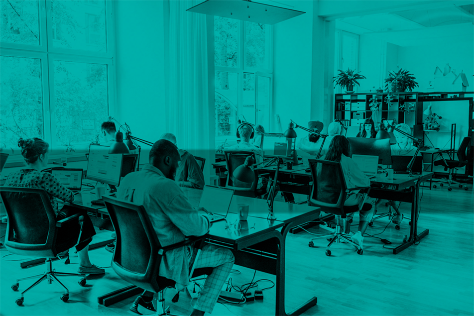 People sat at desks in an office