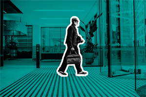 Man about to leave an office through revolving doors