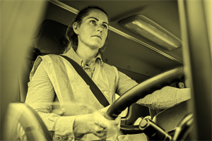 Person driving a vehicle