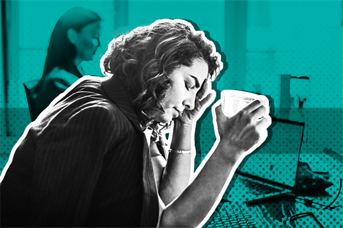 Woman at a desk holding a cup and closing eyes