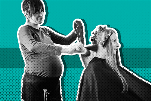 Pregnant hairdresser doing someone's hair