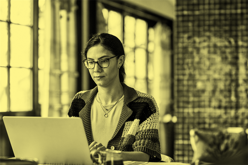 Person sat at a laptop