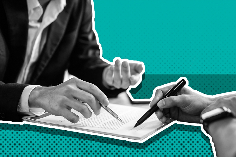 Close up of people signing a contract