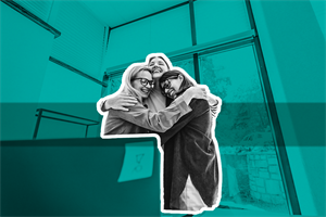 women hugging at work