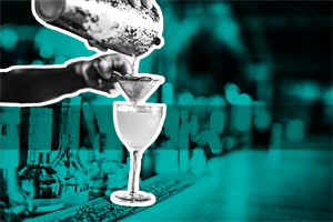 Close up pf someone pouring a cocktail