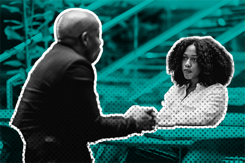 Two people sat at a table