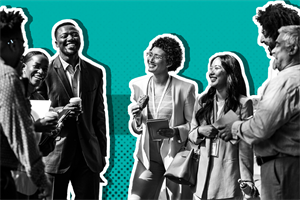 Group of people stood together laughing