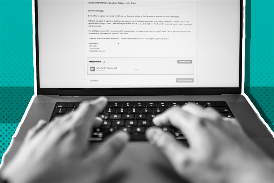 Close up of hands typing on a laptop