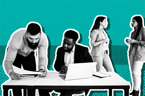 People at a desk looking at work