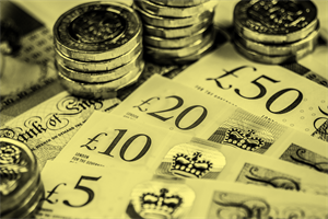 Notes and piles of coins