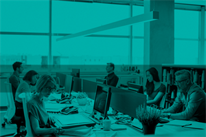 People sat at desks in an office