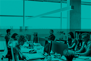 People sat at desks in an office